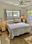 Bedroom with King Bed, Large Dresser and Night Stands